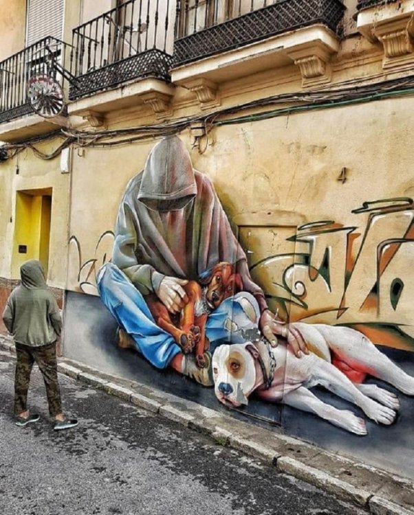 human-with-dogs-on-street-graffiti-mural-by-lalone-laleiro-leilo-in-malaga-spain-1-Photo-by-Marisol.jpg